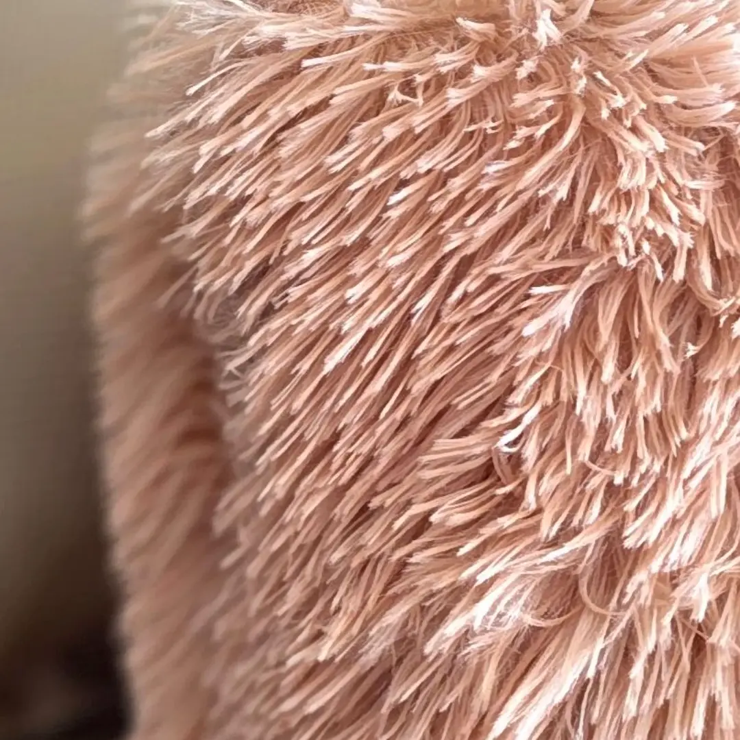 Detalhe macro de manta peluciada rosa